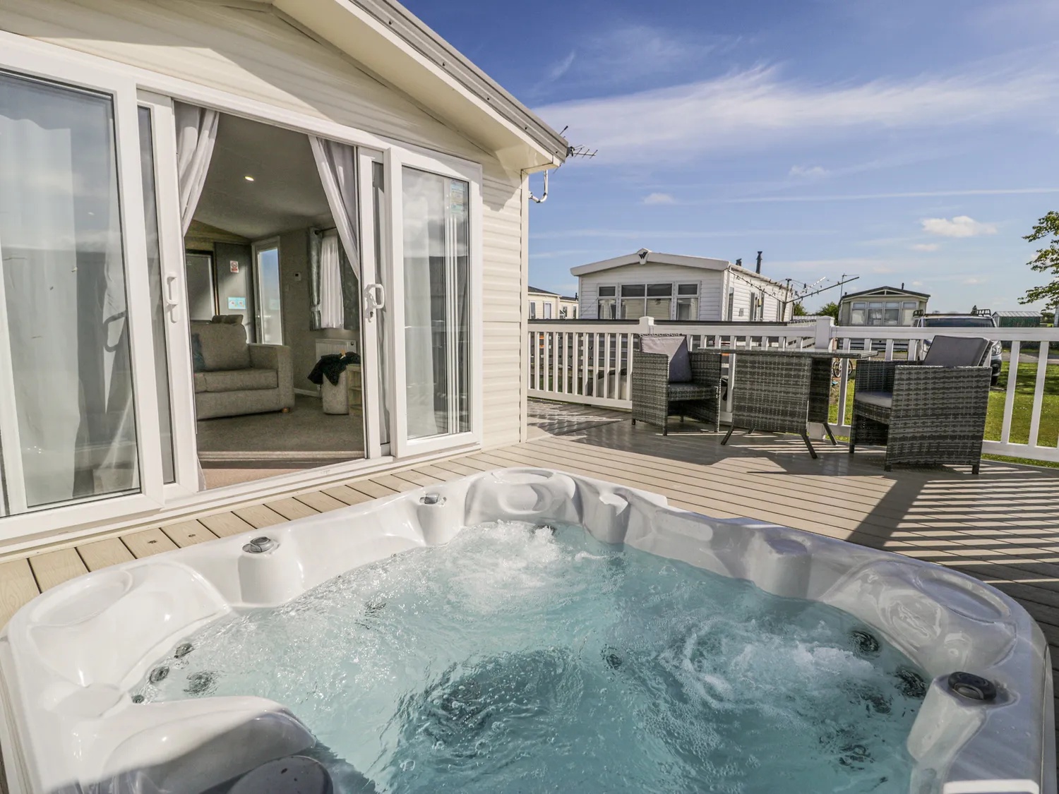 Hot tub and exterior of a lodge